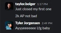 Member celebrating a first $2,000 annual premium close